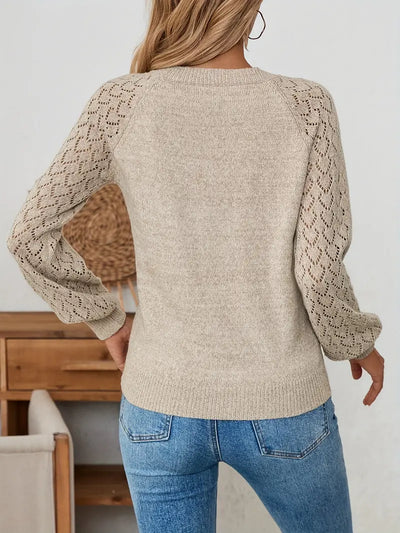 Pull tricot ajouré avec décolleté en V