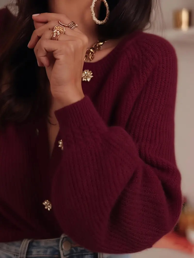 Gilet col rond tricoté avec bouton stylisé