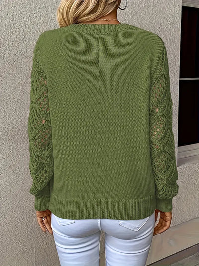 Pull col V manches longues à motifs torsadés