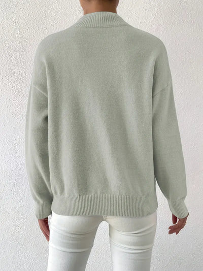 Pull élégant pour femme à col montant manches longues