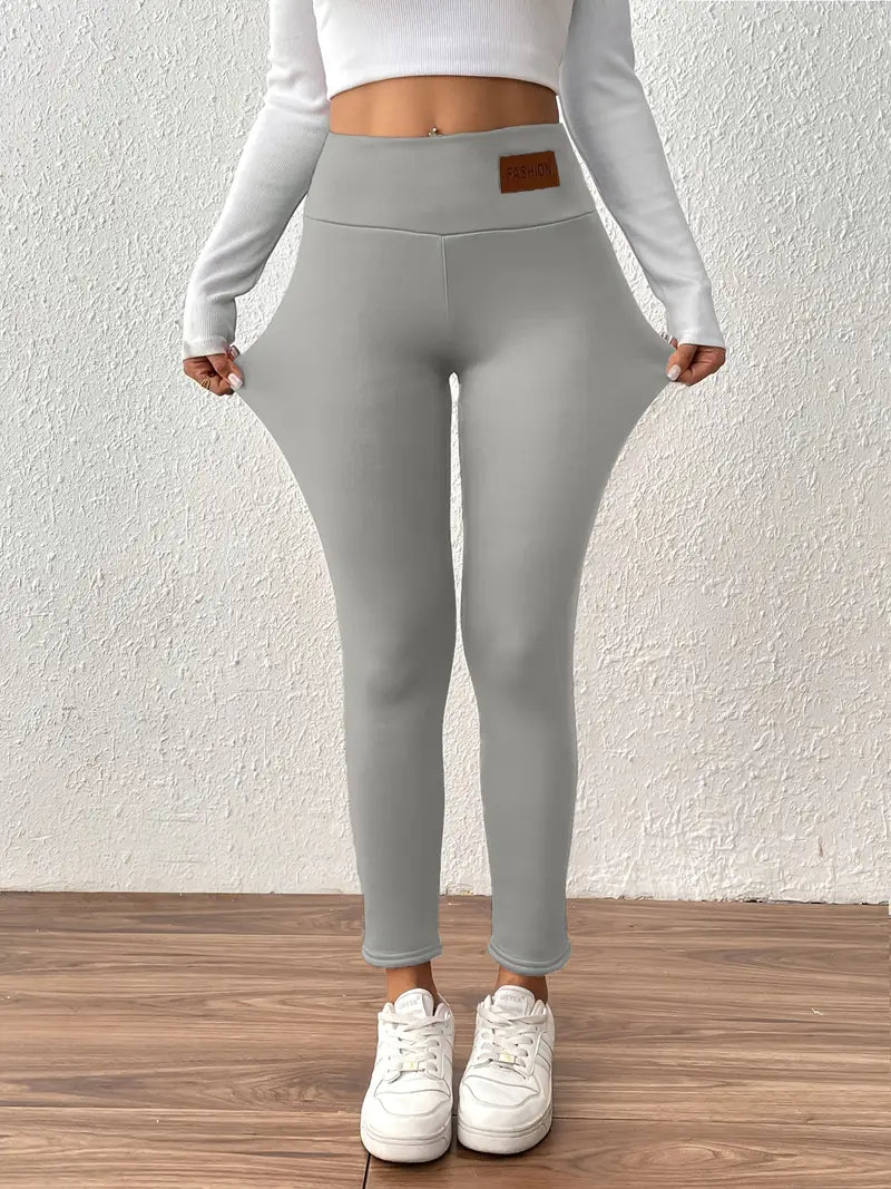 Legging taille haute doublé polaire avec effet remonte-fesses