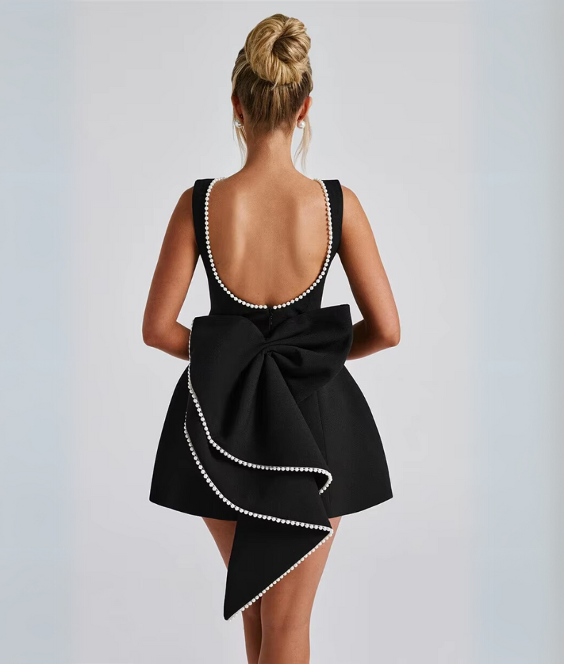 Robe dos nu noeud perlé