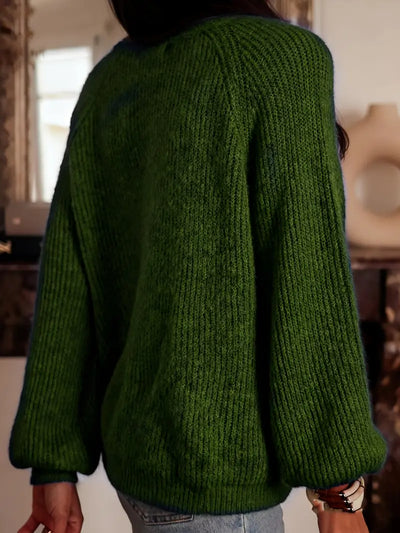 Gilet col rond tricoté avec bouton stylisé