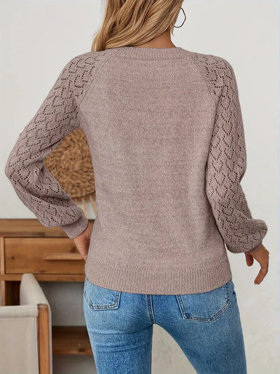 Pull tricot ajouré avec décolleté en V