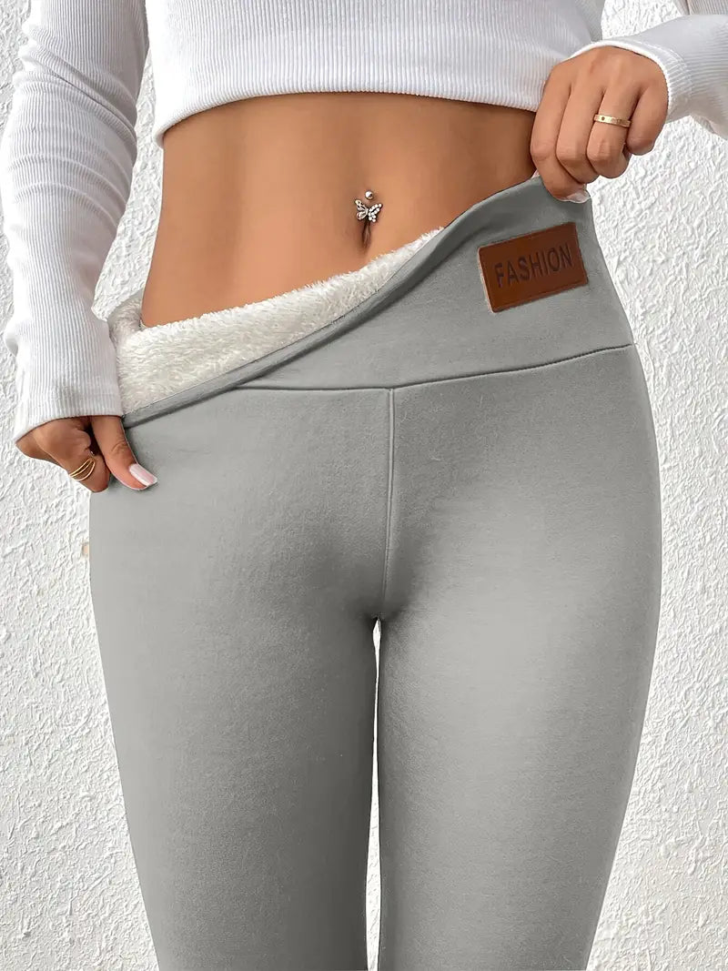 Legging taille haute doublé polaire avec effet remonte-fesses