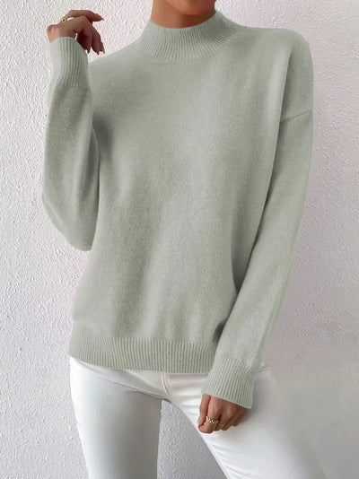 Pull élégant pour femme à col montant manches longues
