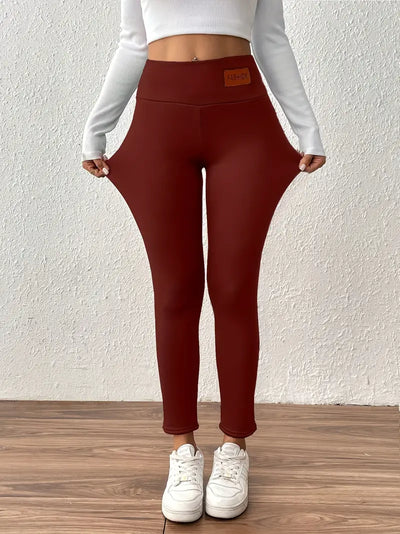 Legging taille haute doublé polaire avec effet remonte-fesses