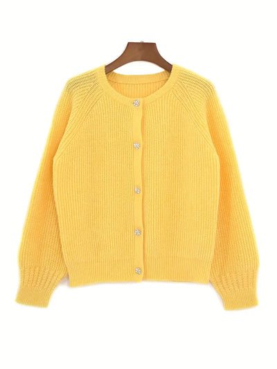 Gilet col rond tricoté avec bouton stylisé