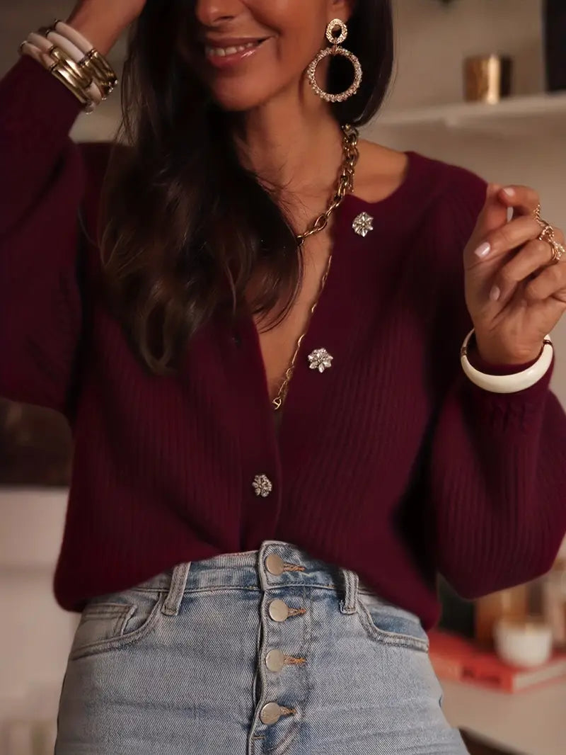 Gilet col rond tricoté avec bouton stylisé