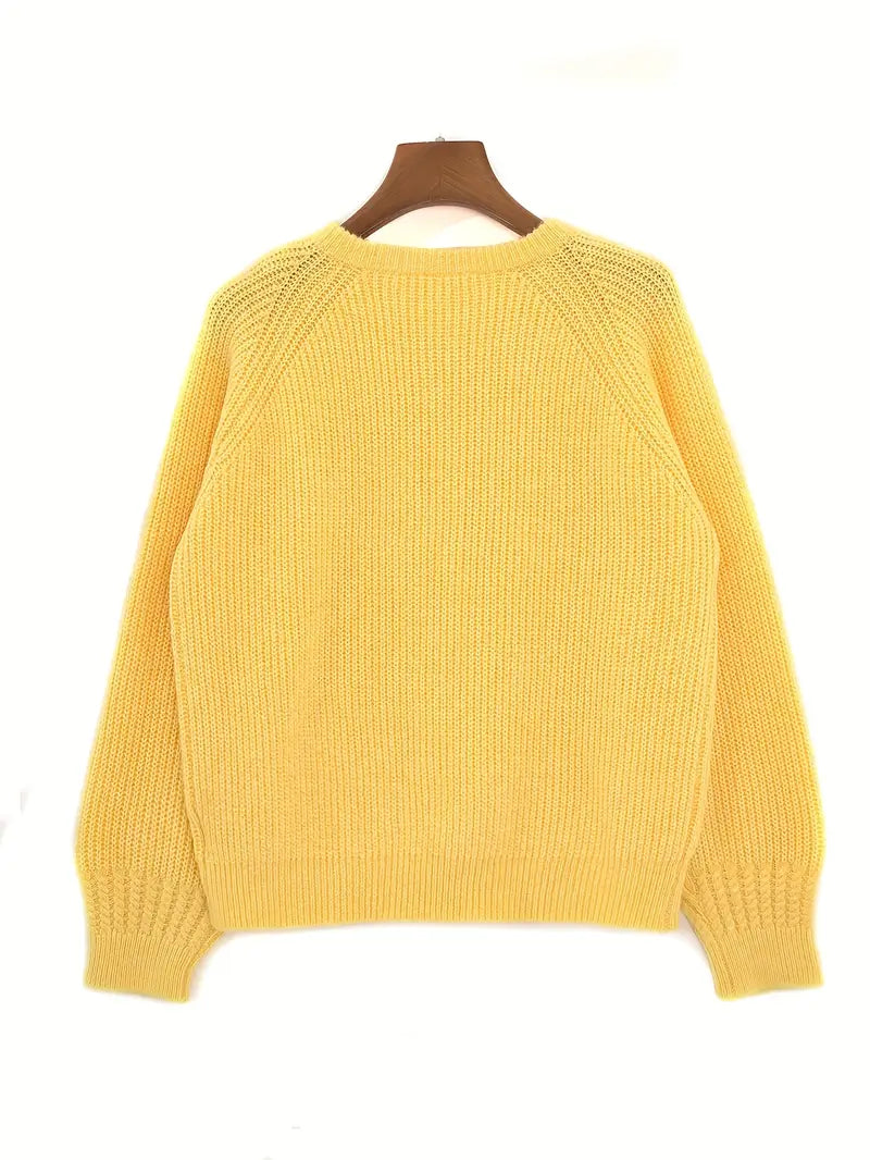 Gilet col rond tricoté avec bouton stylisé