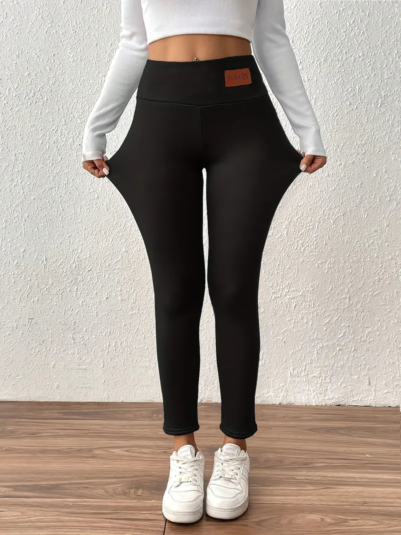 Legging taille haute doublé polaire avec effet remonte-fesses