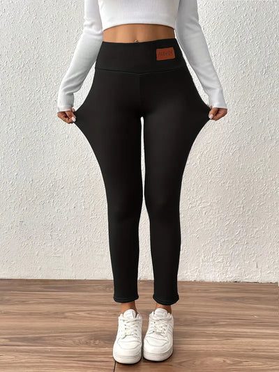 Legging taille haute doublé polaire avec effet remonte-fesses