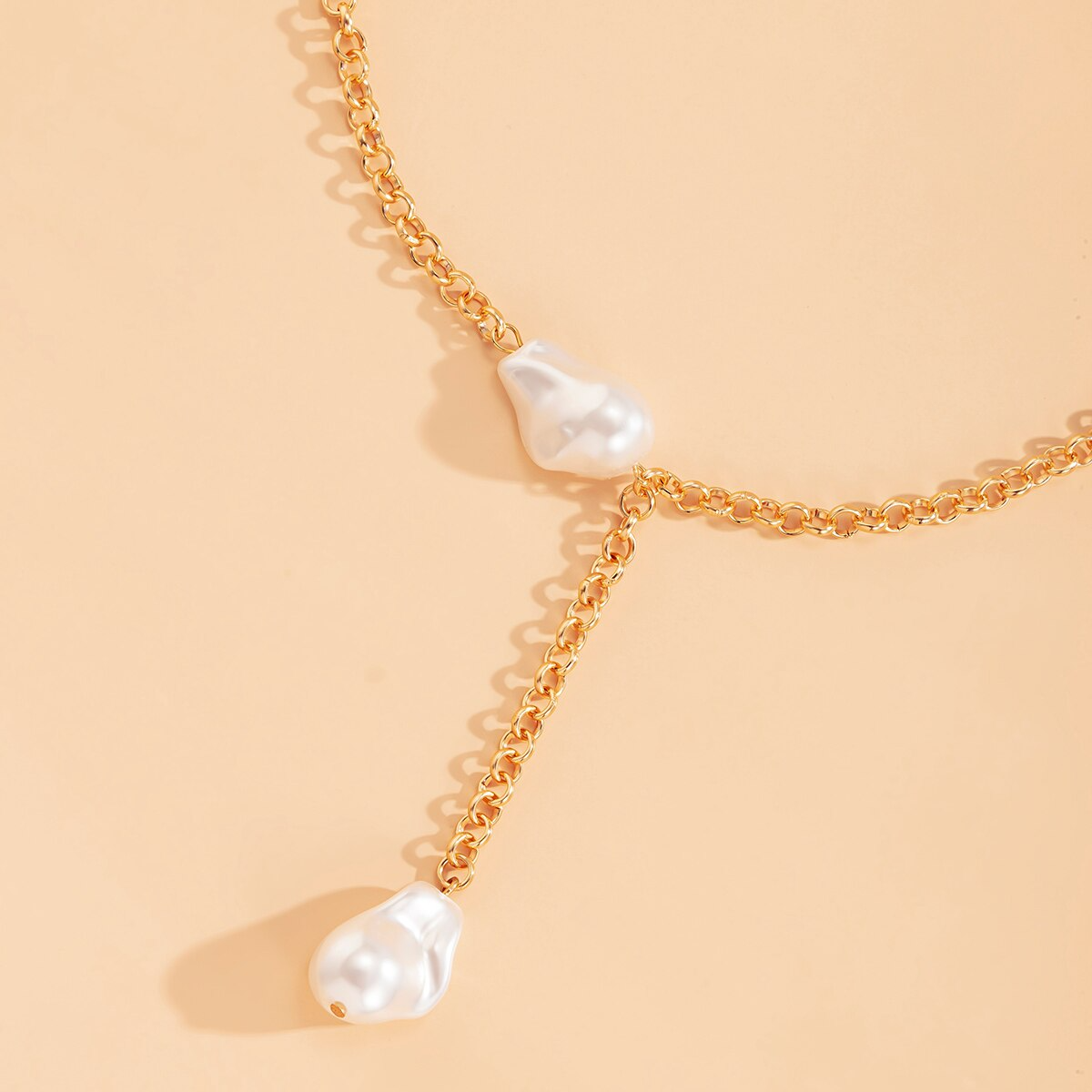 Collier à pampilles avec pendentif en perles