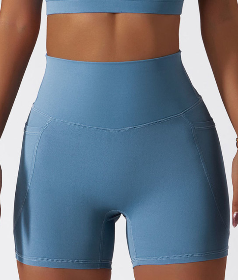Høyt midjesportshorts med lomme