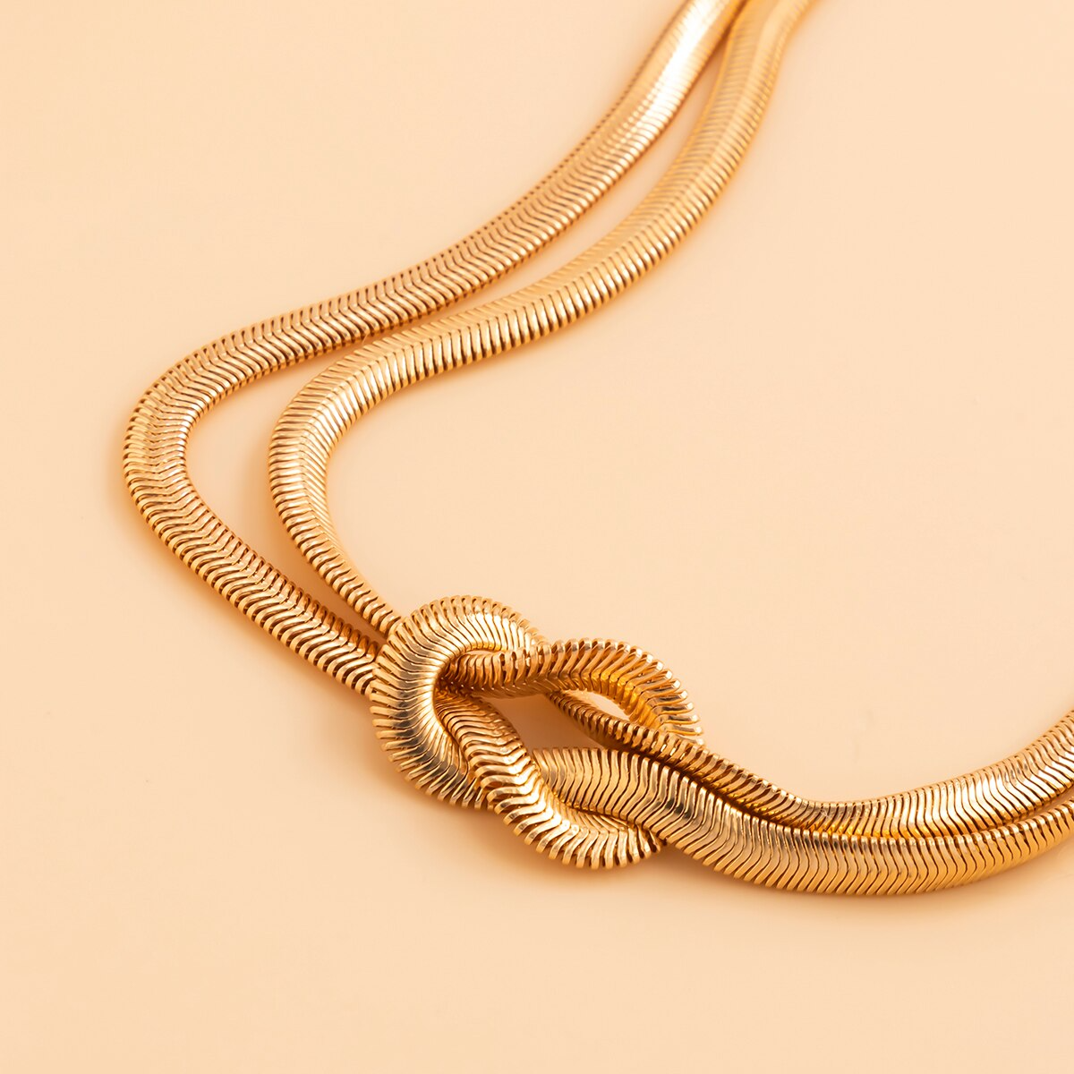 Collier en chaîne serpent plat torsadé