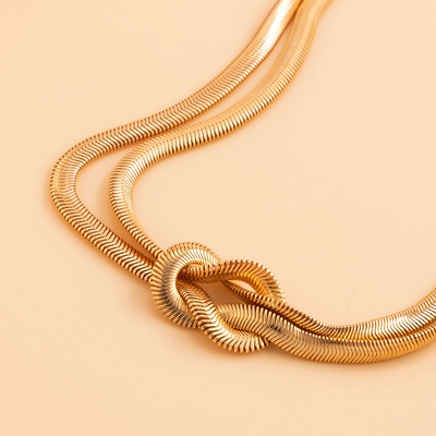 Collier en chaîne serpent plat torsadé