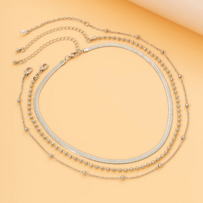 Collier ras du cou et pendentif petite perle blanche