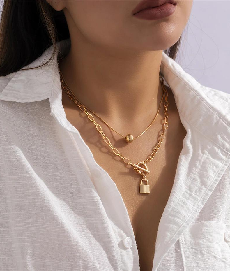 Collier double cadenas et perle