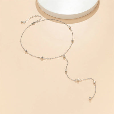 Collier long boules minimalistes
