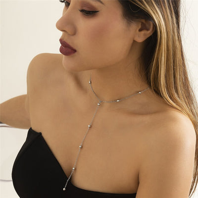 Collier long boules minimalistes