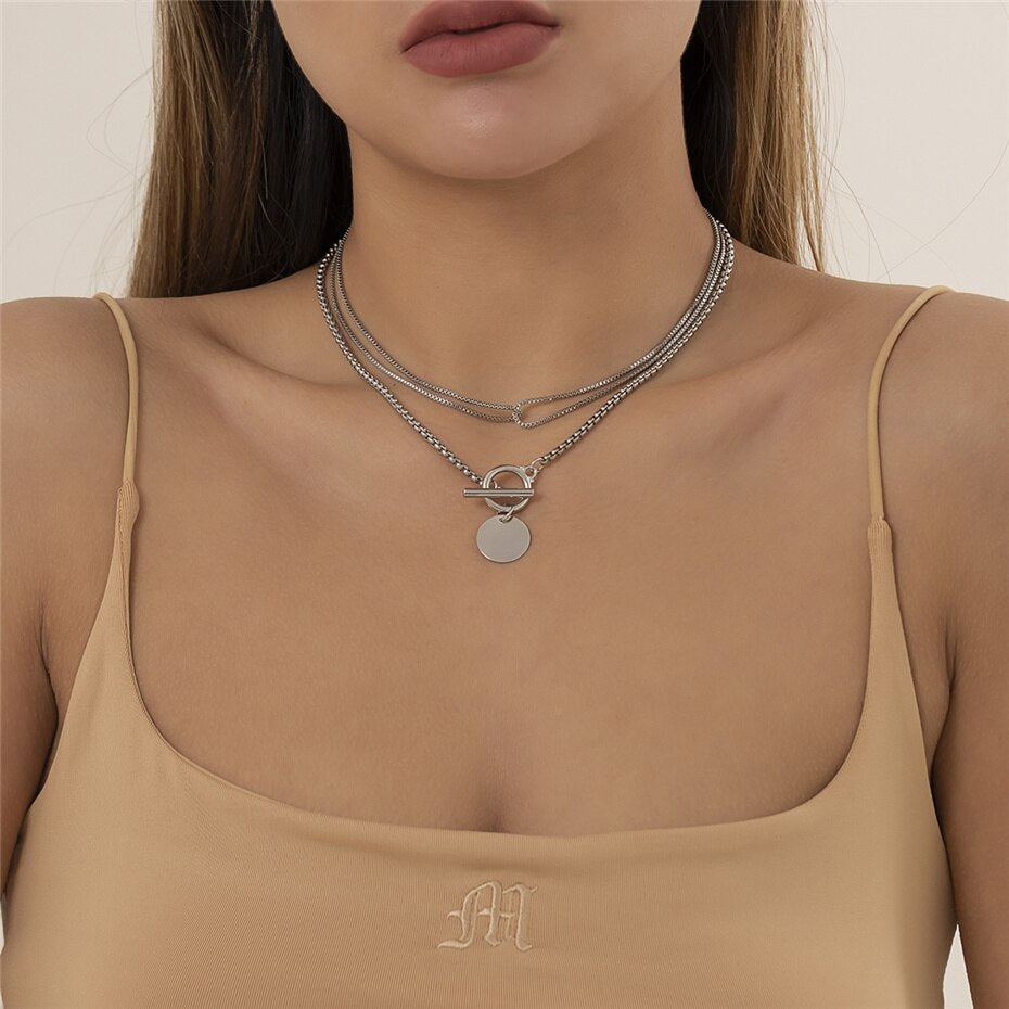Collier double ras du cou pendentif pièces