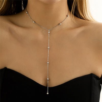 Collier long boules minimalistes