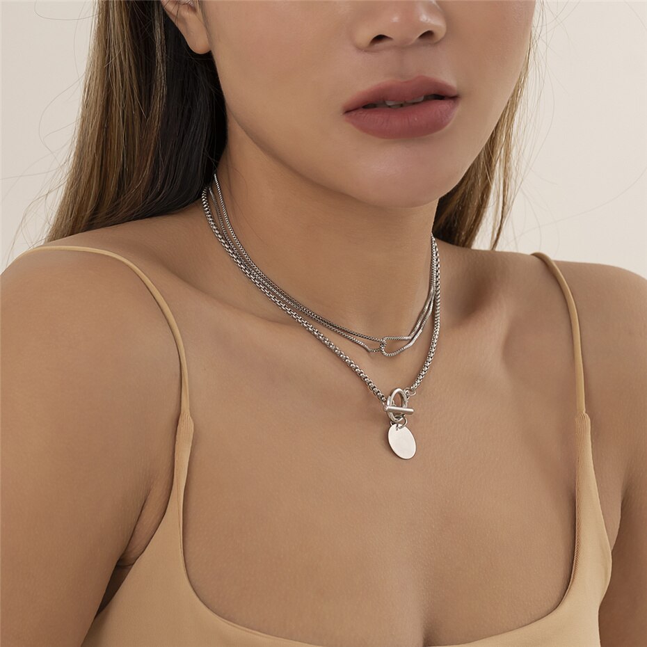 Collier double ras du cou pendentif pièces