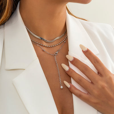 Collier ras du cou et pendentif petite perle blanche