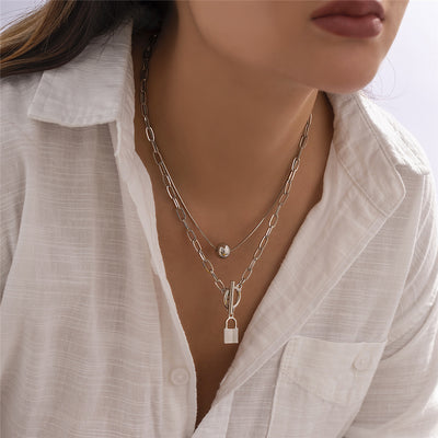 Collier double cadenas et perle