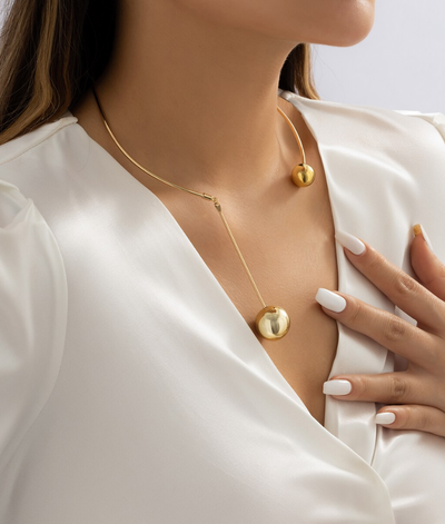 Collier ouvert avec boules