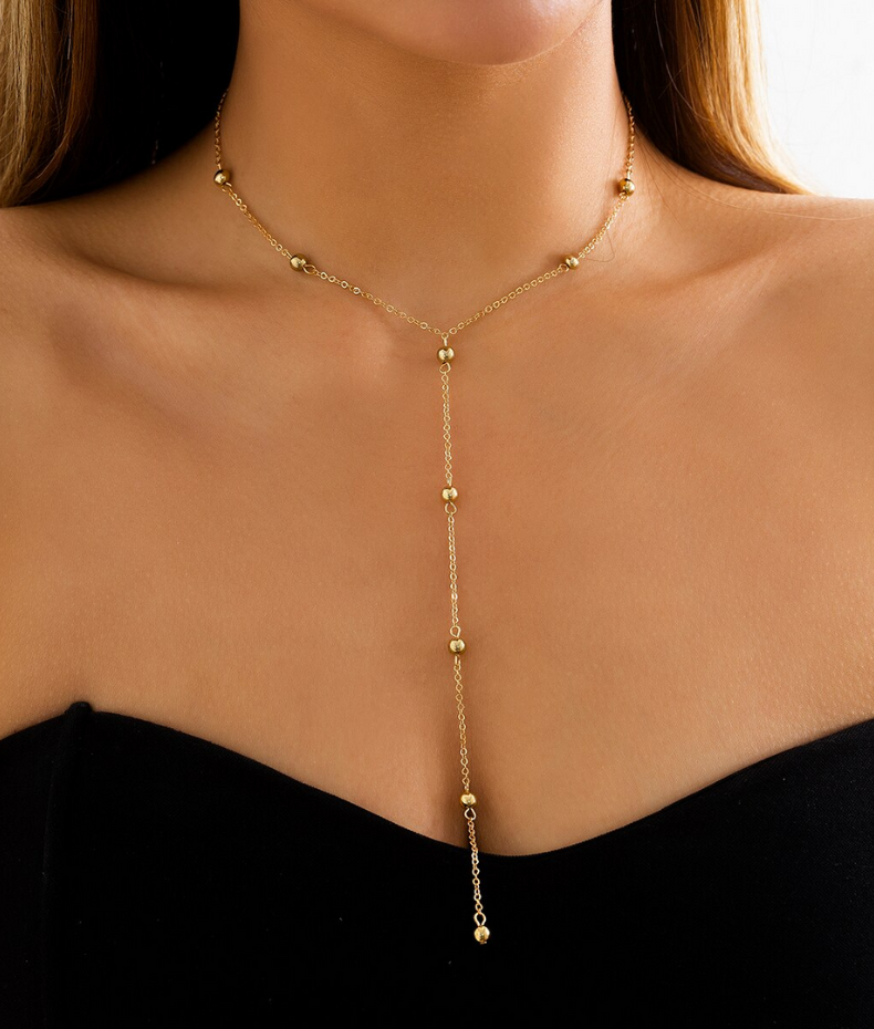 Collier long boules minimalistes
